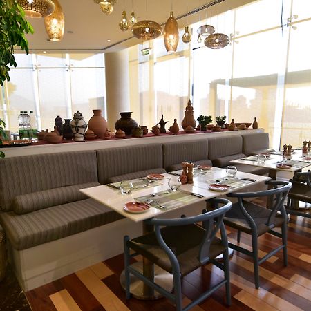 แกรนด์ มิลเลเนียม มัสกัต Hotel ภายนอก รูปภาพ The interior of the restaurant