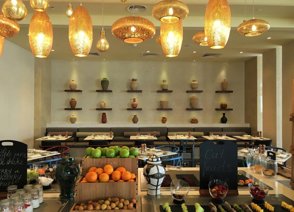 แกรนด์ มิลเลเนียม มัสกัต Hotel ภายนอก รูปภาพ The interior of the restaurant
